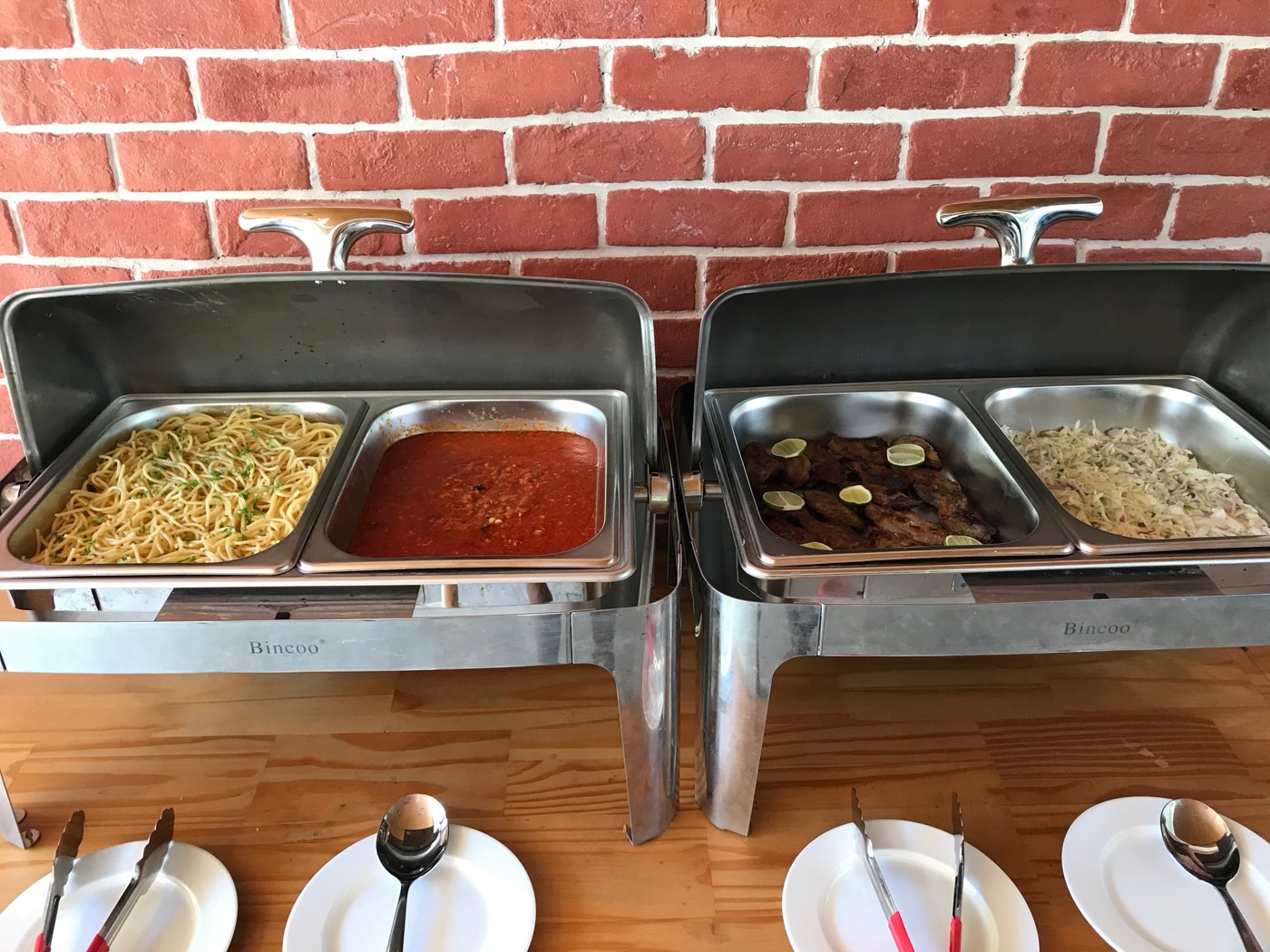 Buffet at Olive Goidhoo restaurant: spaghetti, tomato sauce, grilled fish with lime and salad